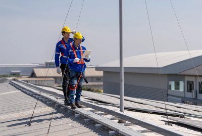 Arden Projects roofing team inspecting a commercial roof