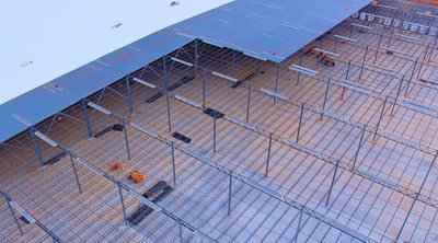 Aerial view of a commercial roofing structure under construction